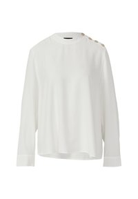 Weiße Langarmbluse mit rundem Ausschnitt und vier beigen Knöpfen entlang der linken Schulternaht.