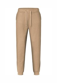 Beige Sweatpants aus weichem Stoff mit elastischem Bund und Kordelzug. Mit gerippten Bündchen an den Knöcheln und einem lässigen Schnitt.