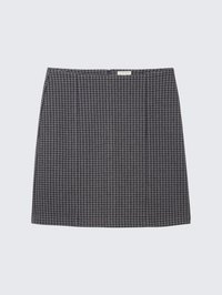 Gonna A-line a scacchi grigio e nera con zip sul retro e una piccola etichetta del marchio vicino all'elastico.