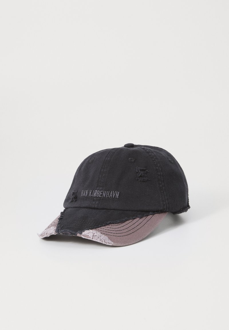 Black baseball cap with frayed edges, contrasting pink underside of the brim, and subtle brand embroidery on the front.