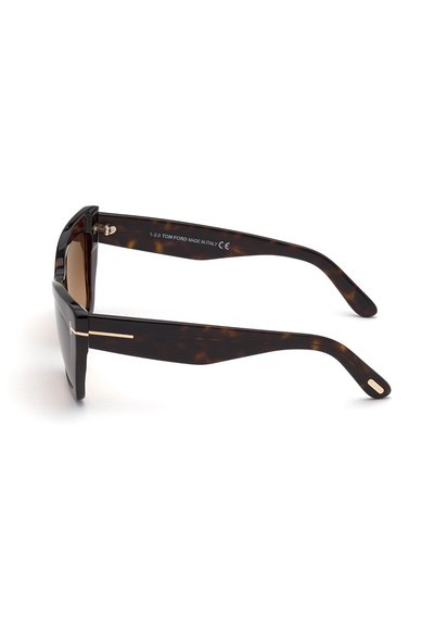 Gafas de sol de carey con lentes rectangulares, montura gruesa y detalles en oro en las patillas. Fabricadas en plástico duradero.