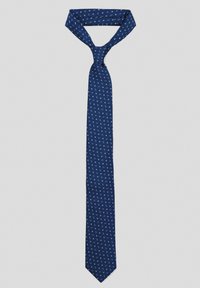 Granatowy krawat jedwabny z subtelnym białym wzorem w diamenty. Wąski krój, spiczasty koniec oraz gładka faktura. Odpowiedni na okazje formalne.