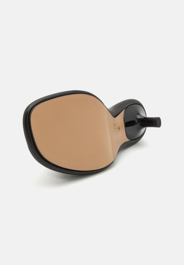 TARA - Heeled mules4