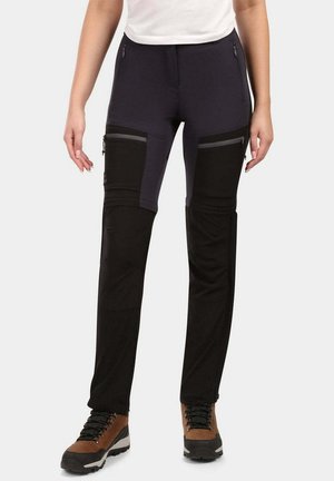 Pantaloni da hiking in tessuto elasticizzato blu navy e neri con tasche con zip, un design aderente e sezioni inferiori rinforzate per una maggiore durata.