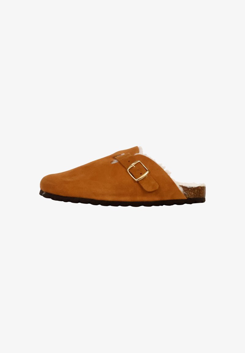 Brown suede slip-on slipper with a buckle, featuring a fluffy inner lining and a textured black sole. Rounded shape and no back.