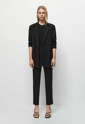 MIT SCHLITZEN - Pantalon classique - black