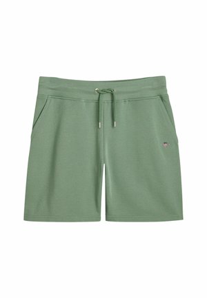 Gröna bomullsshorts med elastisk midja, justerbar dragsko, två sidofickor och en liten logodetalj på vänster ben.