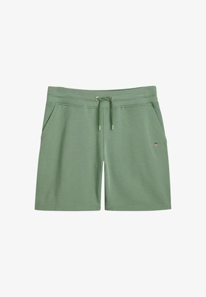 Gröna bomullsshorts med elastisk midja, justerbar dragsko, två sidofickor och en liten logodetalj på vänster ben.