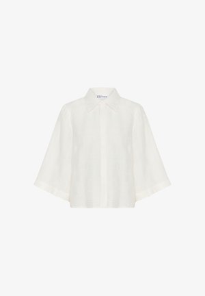 Bluză albă ușoară, cu un finisaj texturat și pliabil, având un guler ascuțit și mâneci scurte, late. Se închide cu nasturi în față.