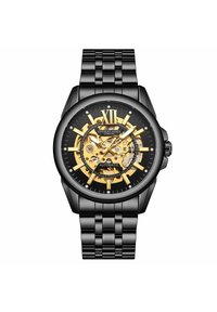 Zwarte automatische klok met een transparante gouden uurwerk, grote gouden uuraanduiders en een zwart metalen schakelarmband.