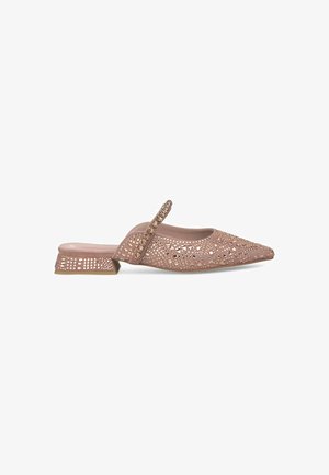 Blush pink mule shoes with cutout design, decorative accents, and a low block heel. Smooth texture with a pointed toe silhouette.