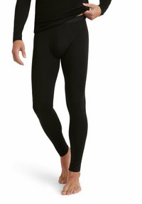 Zwarte, strakke thermoleggings gemaakt van een soepel, rekbaar materiaal, met een brede elastische tailleband en een gecontourde pouchontwerp.
