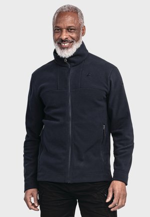 Navy fleece zip-up jacket with high collar, featuring two side pockets and a subtle logo on the upper left. Smooth texture throughout.