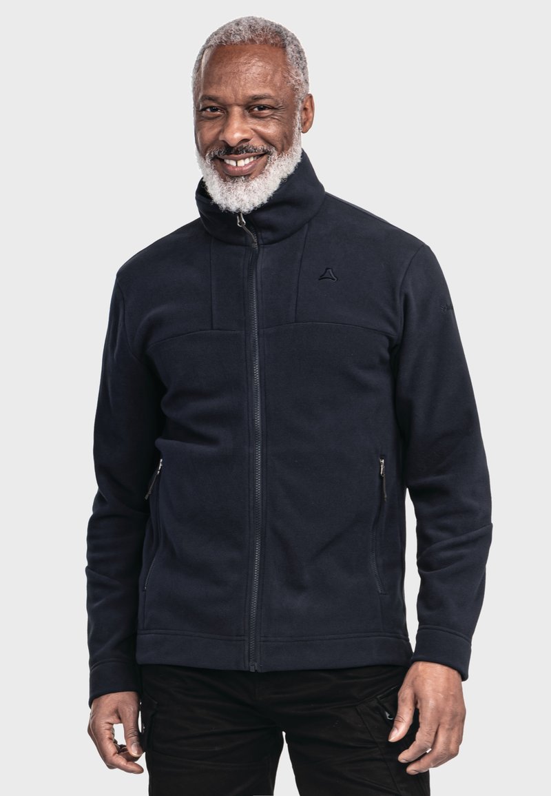 Navy-Fleece-Trainingsjacke mit hohem Kragen, ausgestattet mit zwei Seitentaschen und einem dezenten Logo auf der oberen linken Seite. Durchgehend glatte Textur.