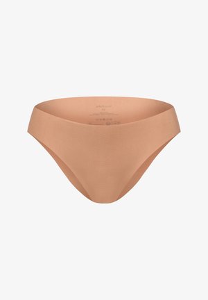 Nude seamless damesondergoed met een gladde textuur, low-rise ontwerp en geen zichtbare naden. Geschikt voor dagelijks gebruik.