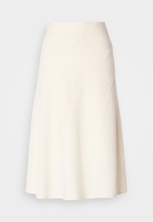 A-line skirt in cream-colored fabric, featuring diagonal seams, smooth texture, and a flared silhouette. No visible fastenings or patterns.
