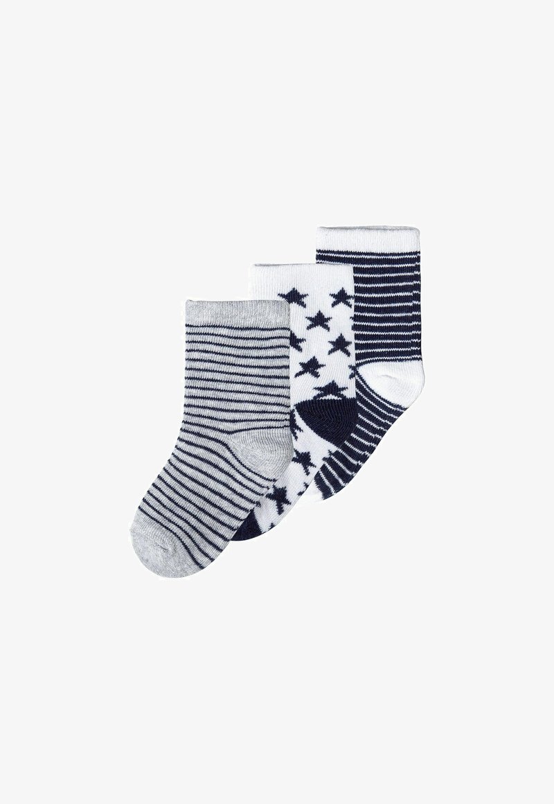 Trzy pary skarpetek: jedna w szaro-granatowe paski, jedna biała w granatowe gwiazdy, a jedna granatowa w białe paski. Materiał bawełniany.