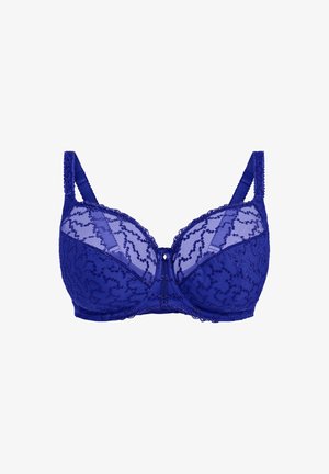 Lila Spitzen-BH mit halbtransparenten Cups, bestickten Details, verstellbaren Trägern und einem dekorativen Schleifenakzent in der Mitte.