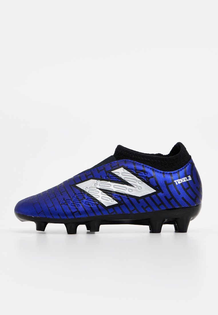 Botines de fútbol para terreno firme