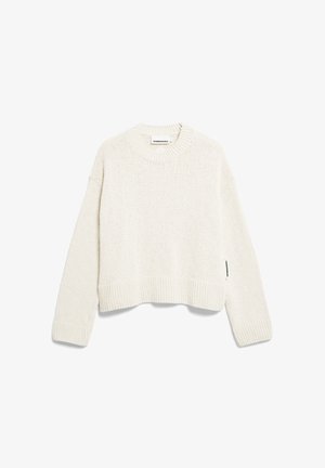 Pull court couleur crème avec un motif de tricot texturé, col et ourlet côtelés, avec des épaules tombantes et une étiquette sur la manche.