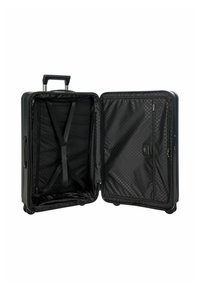 Valigia rigida nera con manico retrattile, completamente aperta. L'interno presenta una fodera a motivo esagonale, cinghie e una tasca laterale.