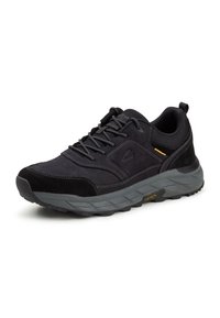 Black athletic shoe featuring a mix of smooth and textured materials, reinforced toe, thick sole, and subtle yellow accent.