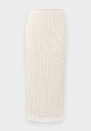 Lys beige midiskjørt med vertikal ribbet tekstur, mykt stoff, elastisk midjebånd og lett utsvingt kant. Ingen synlig maskinvare eller aksenter.