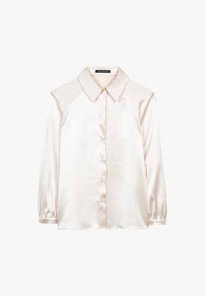 Light beige satin blouse with a classic collar, button-down front, and long, slightly gathered sleeves. Smooth texture with a subtle sheen.