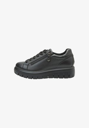 Black leather sneakers with textured finish, lace-up design, side zipper, and chunky rubber sole featuring deep grooves for traction.