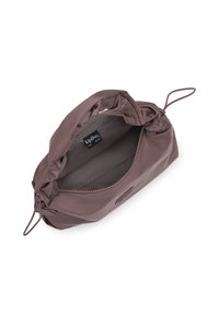 Brown, soft-textured bag with a gathered handle, zipper closure, and a smooth interior. Interior label reads "Kipling Live Light."