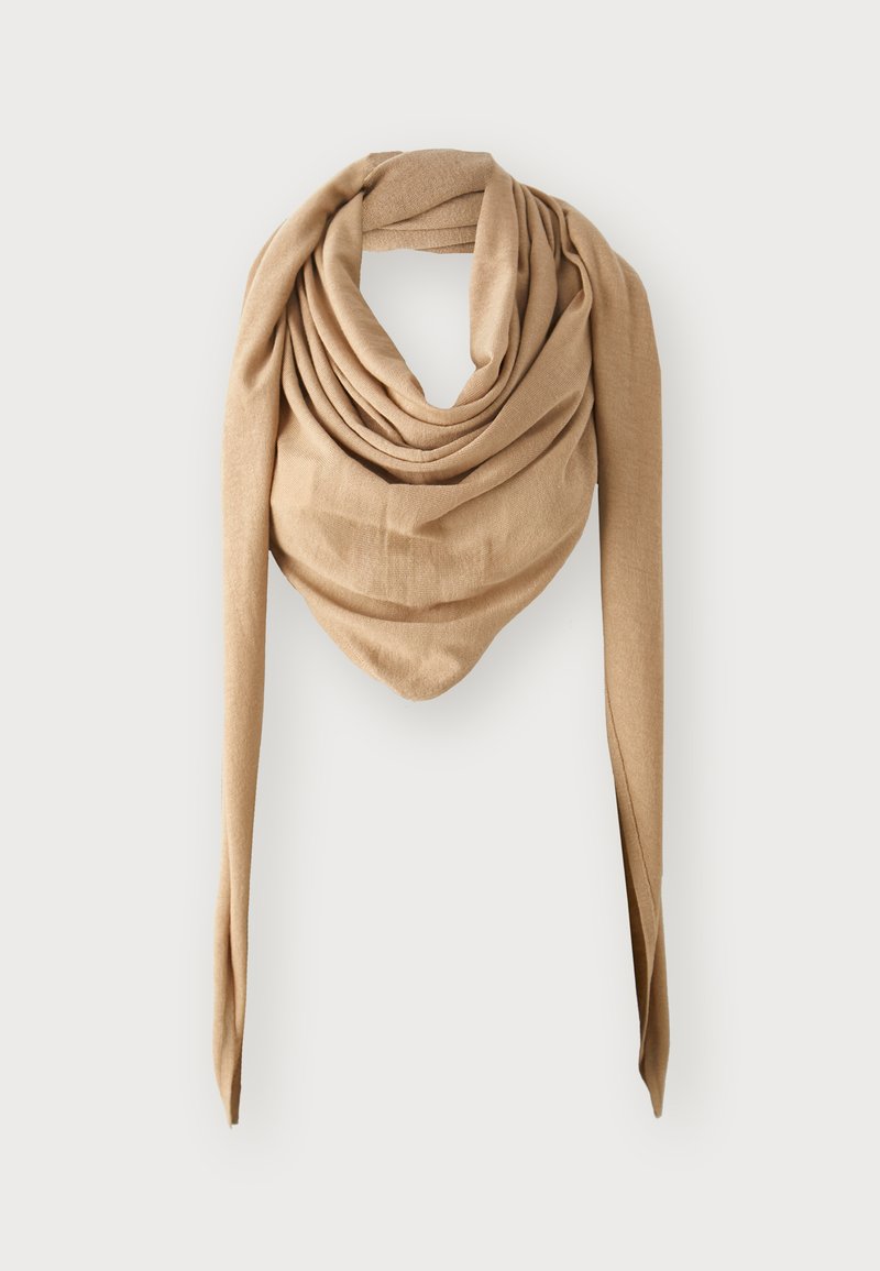 Beige, woven scarf with a draped design, featuring soft texture and long tapered ends. Suitable for versatile styling and layering.