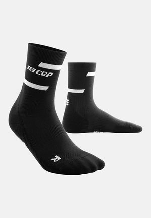 THE RUN COMPRESSION SOCKS MID CUT WOMEN - MADE IN GERMANY - Sports socks - black