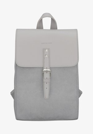 Gray fabric backpack with a smooth gray leather flap, metal buckle detail, and a front strap. Features adjustable shoulder straps.
