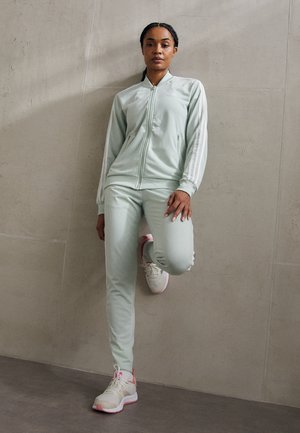 adidas Sportswear ESSENTIALS 3-STRIPES - Tuta - linen green/white