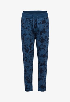 Marineblå joggingbukser lavet af blødt stof, med et struktureret mønster, elastisk talje og snor, samt en lille logoaccent.