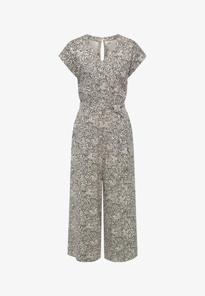 Jumpsuit made of lightweight fabric with a black and white leaf pattern, short sleeves, and a keyhole back detail. Wide-leg design.