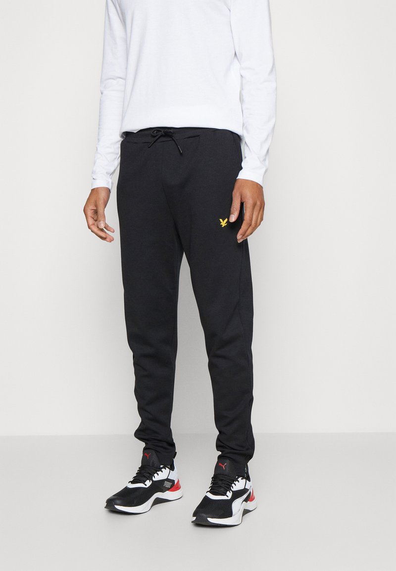 Lyle & Scott FLY TRACKIES Tracksuit bottoms jet black/black