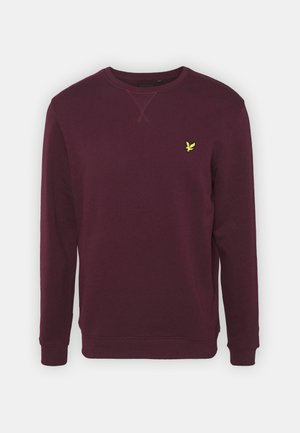Felpa bordeaux con maniche lunghe, polsini a costine e collo a giro. Presenta un piccolo logo di un uccello giallo sul lato sinistro del petto. Tessuto morbido.
