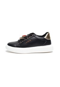 Black sneaker with leather upper, gold accents at the heel, decorative lace closure, and white rubber sole. Features brand name in gold.