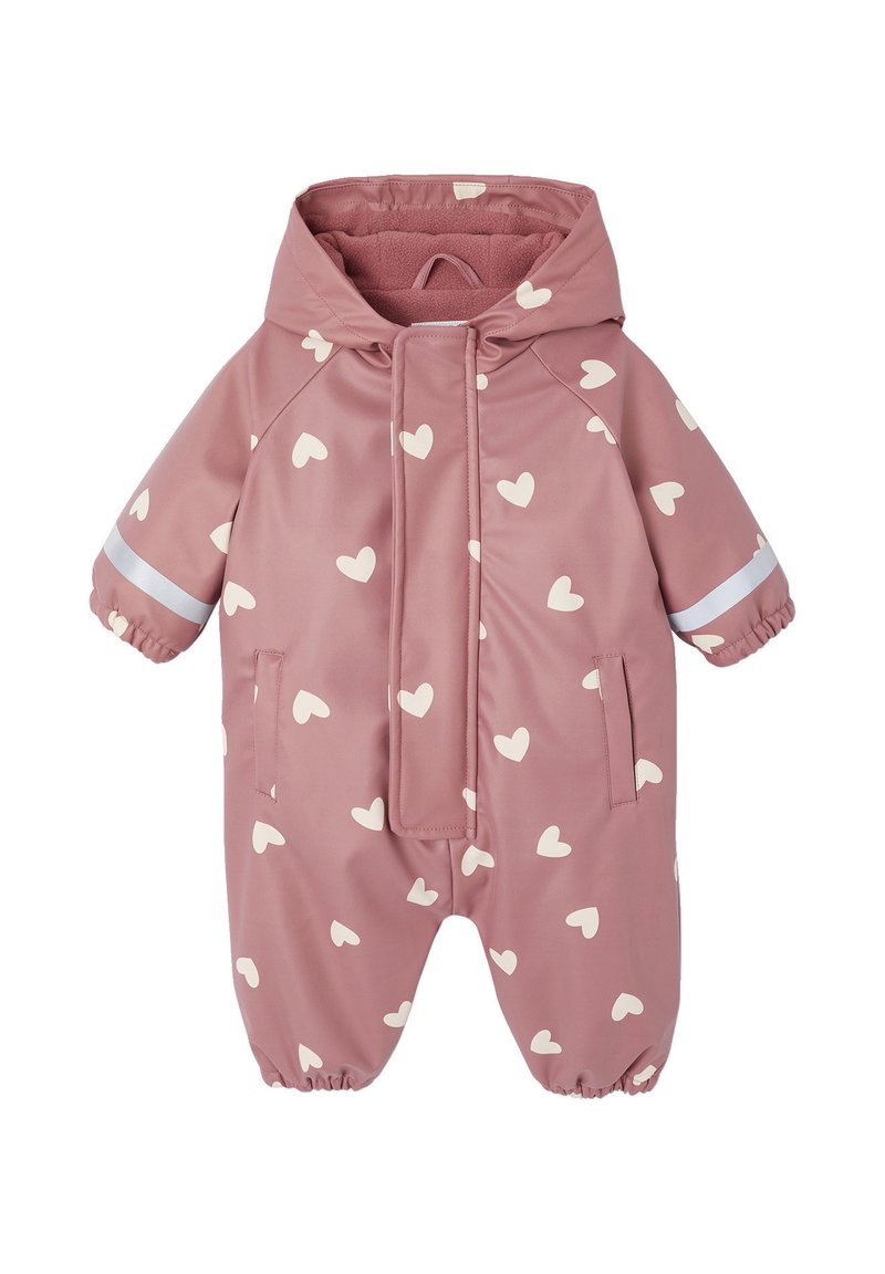 Pink waterproof overall with white heart patterns, a hood, elastic cuffs, and a front zipper. Features reflective accents and side pockets.