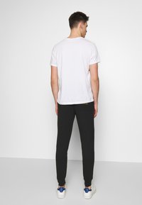 EA7 Emporio Armani TROUSER - Παντελόνι φόρμας - black