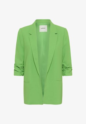 Zeleni sako od glatke tkanine, bez ovratnika, s potrubljenim rukavima i prednjim džepovima. Nema kopčanja; otvoreni prednji dio.