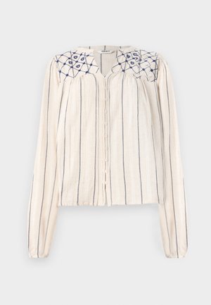 Beige long-sleeve blouse with navy vertical stripes, button front, and embroidered floral design on the neckline. Textured fabric.
