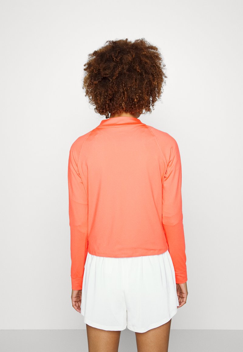 Damen Sportbekleidung | Nike Performance Langarmshirt magic ember/white/apricot - JA44231 Damen Sportbekleidung | Nike Performance Langarmshirt magic ember/white/apricot - JA44231