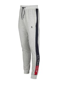 Harmaat collegehousut, joissa on laivastonsinisiä sivuviivoja, musta nauhavyötärö ja "U.S. POLO ASSN." -teksti alaosan viivassa.