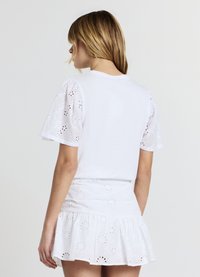 Calliope SANGALLO LATERALE - T-shirt con stampa - bianco ottico