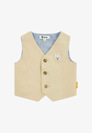 Beige Weste mit V-Ausschnitt, drei goldenen Knöpfen, einem Bärenmotiv und chambray Innenfutter mit horizontalen Streifen. Mit einem gelben Etikett.