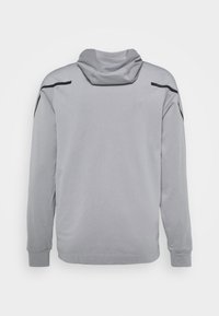 Nike Performance Sweat à capuche - grey