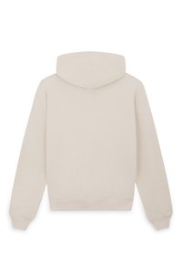 Felpa con cappuccio beige dal texture morbido, progettata con una vestibilità rilassata, polsini a coste e tasca a marsupio, senza branding visibile.