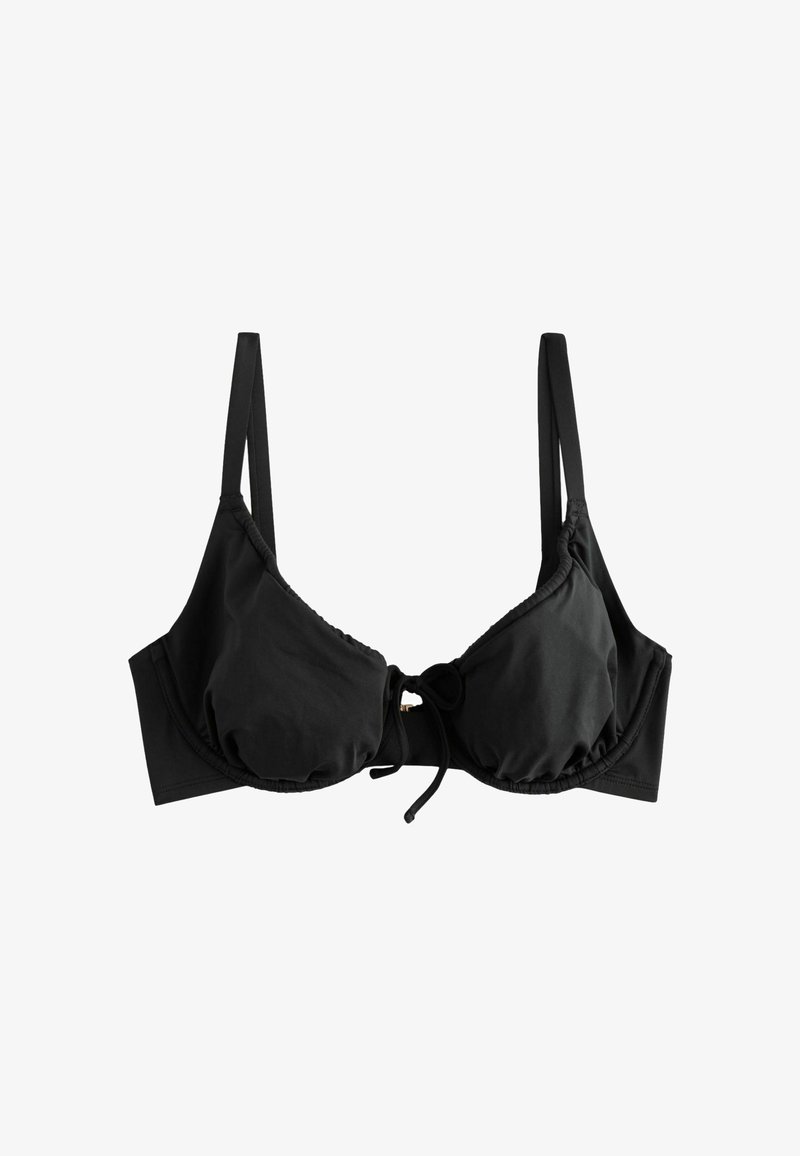 Haut de bikini noir à bonnets triangulaires, bretelles réglables et fermeture nouée à l'avant. Confectionné en tissu lisse et doux avec des accents minimaux.